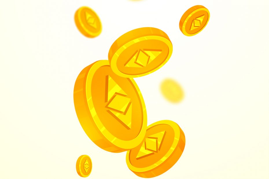 Etherium cryptocurrencies coins in golden color on blur background.