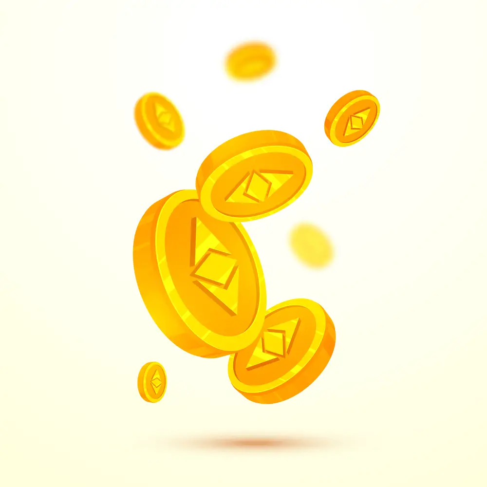 Etherium cryptocurrencies coins in golden color on blur background.